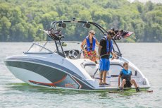 All Yamaha 240 Series models feature a signature transom design that incorporates a lounge area and places the swim platform just above water level. Can speakers and board racks on the tower are optional.