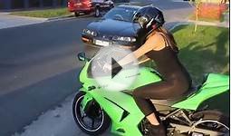 Girl Wheelie on Motorcycle Yamaha R1