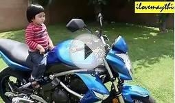 My Son Hulyan and the blue Kawasaki ER-6N Standard Motorcycle